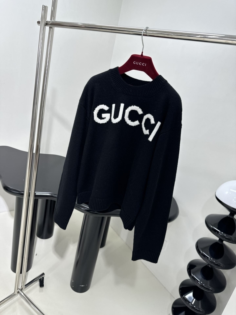 G*u*i sweaters
